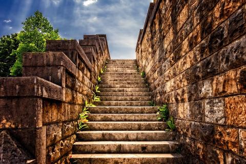 Picture of ancient staircase, going up, symbolizing aging
